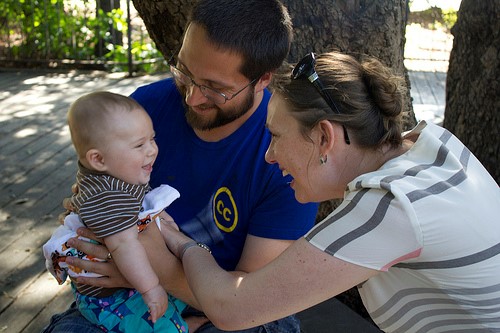 Parents playing with children