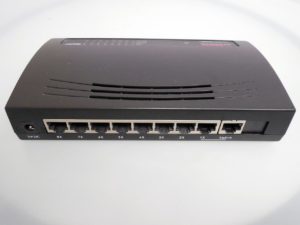 black broadband router - switching off devices at night can help you sleep better